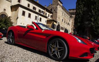 Get behind the wheel of the exclusive red convertible Ferrari and drive  along the breathtaking curves of Tuscany's countryroads